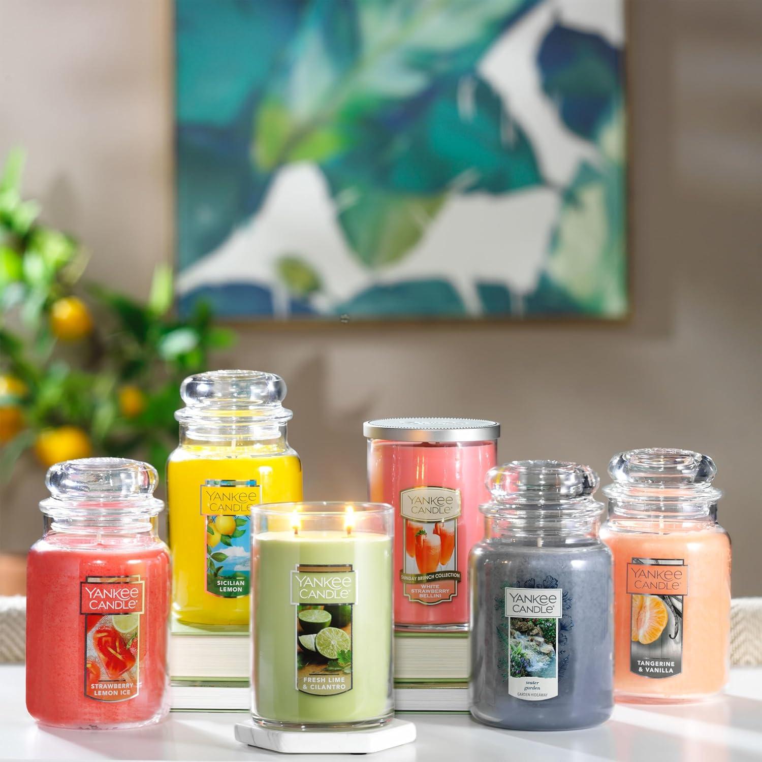 imageYankee Candle French Vanilla Scented Classic 22oz Large Jar Single Wick Candle Over 110 Hour Burn Time Ideal for Entertaining Personal Relaxation GiftingTangerine Vanilla