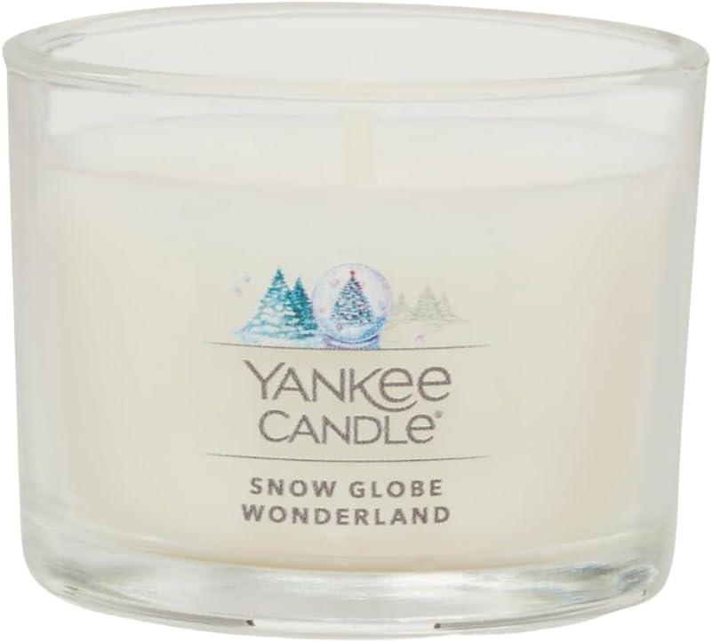 imageYankee Candle Signature Votive Mini Candle Jar Snow Globe Wonderland Scent Natural Soy Wax Blend Candle with Natural Fiber Wick 13 OZ Glass Jar Pack of 4Snow Globe Wonderland