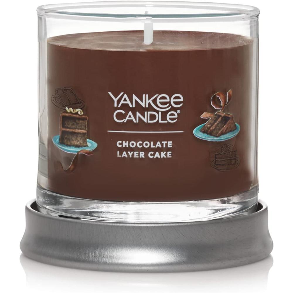 imageYankee Candle Large Tumbler Scented Candle with up to 80 Hour Burn Time Premium Plant Wax Blend for Consistent Burn 20 oz Tumbler Candle with Room Filling Fragrance Christmas CookieChocolate Layer Cake