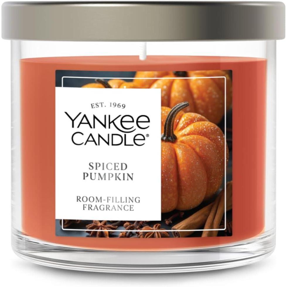 imageYankee Candle Medium Pillar Scented Candle with up to 115 Hour Burn Time Premium Plant Wax Blend for Consistent Burn 1425 oz Pillar Candle with Room Filling Fragrance Pumpkin Banana SconeSpiced Pumpkin