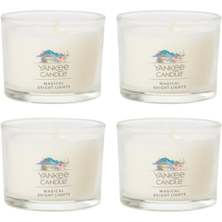 imageYankee Candle Signature Votive Mini Candle Jar Midsummers Night Scent Natural Soy Wax Blend Candle with Natural Fiber Wick 13 OZ Glass Jar Pack of 4Magical Bright Lights