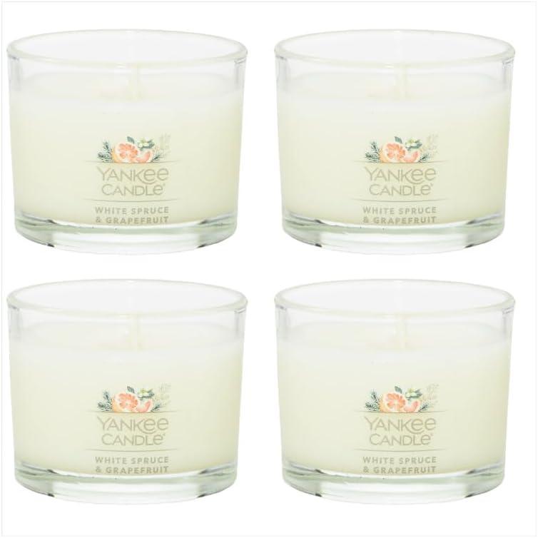 imageYankee Candle Signature Votive Mini Candle Jar Snow Globe Wonderland Scent Natural Soy Wax Blend Candle with Natural Fiber Wick 13 OZ Glass Jar Pack of 4White Spruce  Grapefruit