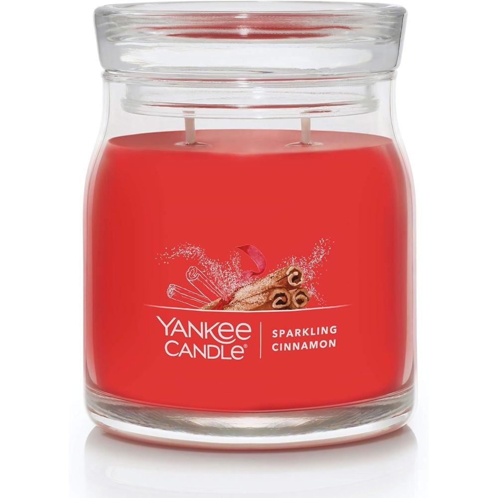 imageYankee Candle Studio Scented Candle with up to 50 Hour Burn Time Premium Plant Wax Blend for Consistent Burn 10 oz Jar Candle with Room Filling Fragrance Spiced PumpkinSparkling Cinnamon