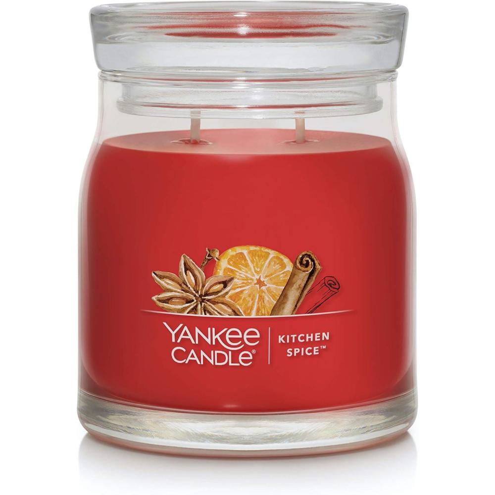 imageYankee Candle Studio Scented Candle with up to 50 Hour Burn Time Premium Plant Wax Blend for Consistent Burn 10 oz Jar Candle with Room Filling Fragrance Spiced PumpkinKitchen Spice
